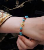 Blue Turquoise and Gold Four-Leaf Flower Bracelet - Image 2